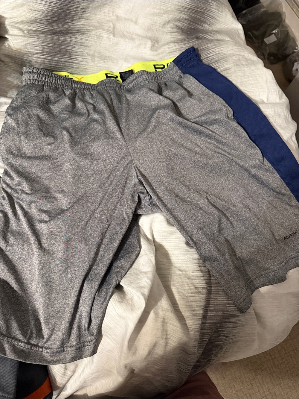 Men's Gray Athletic Shorts with Blue Side Panel and Neon Waistband